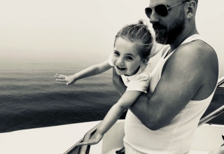 Adam and his daughter Florence smiling together
                           title=